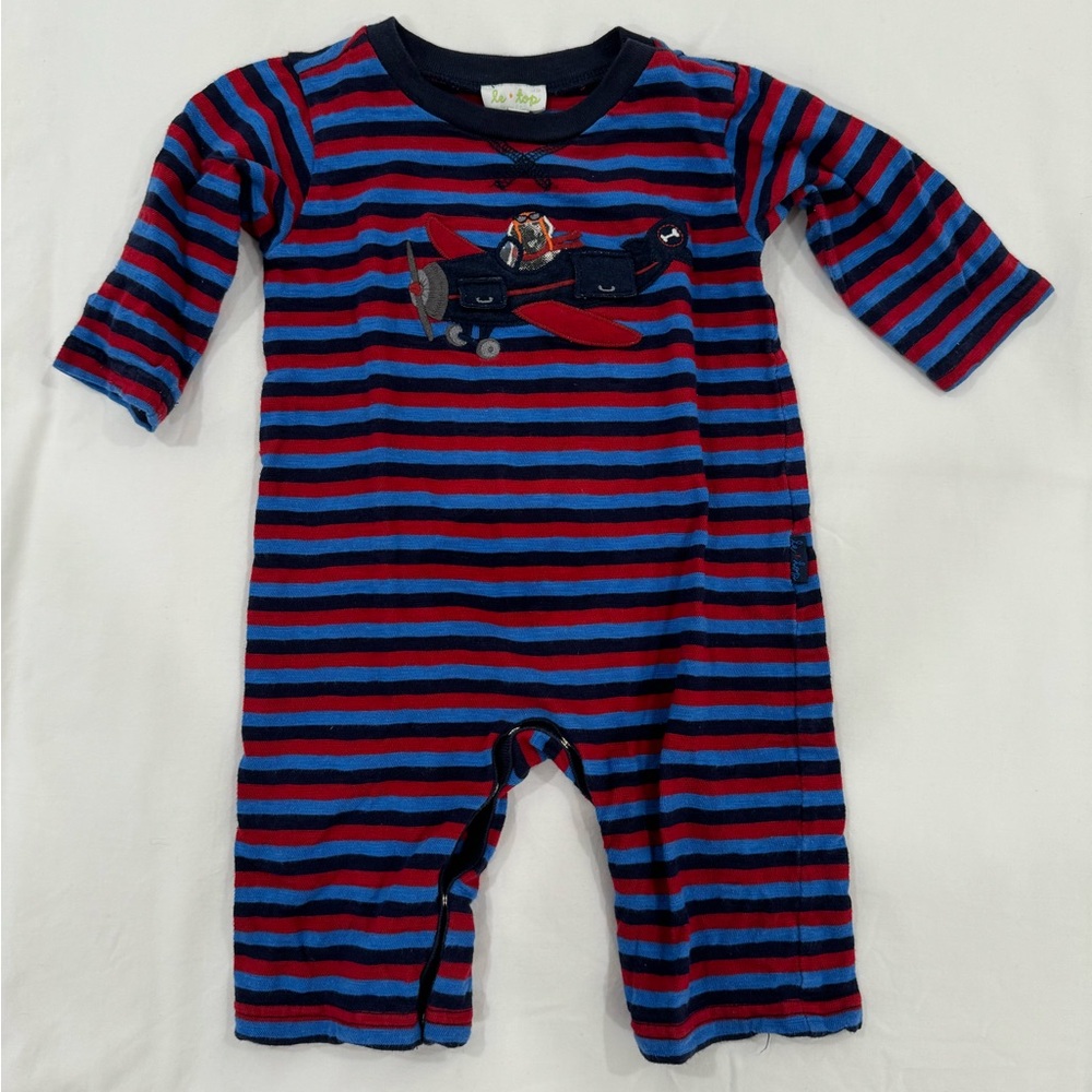 EUC le Top coverall with dog in an airplane. Size 6-9mo